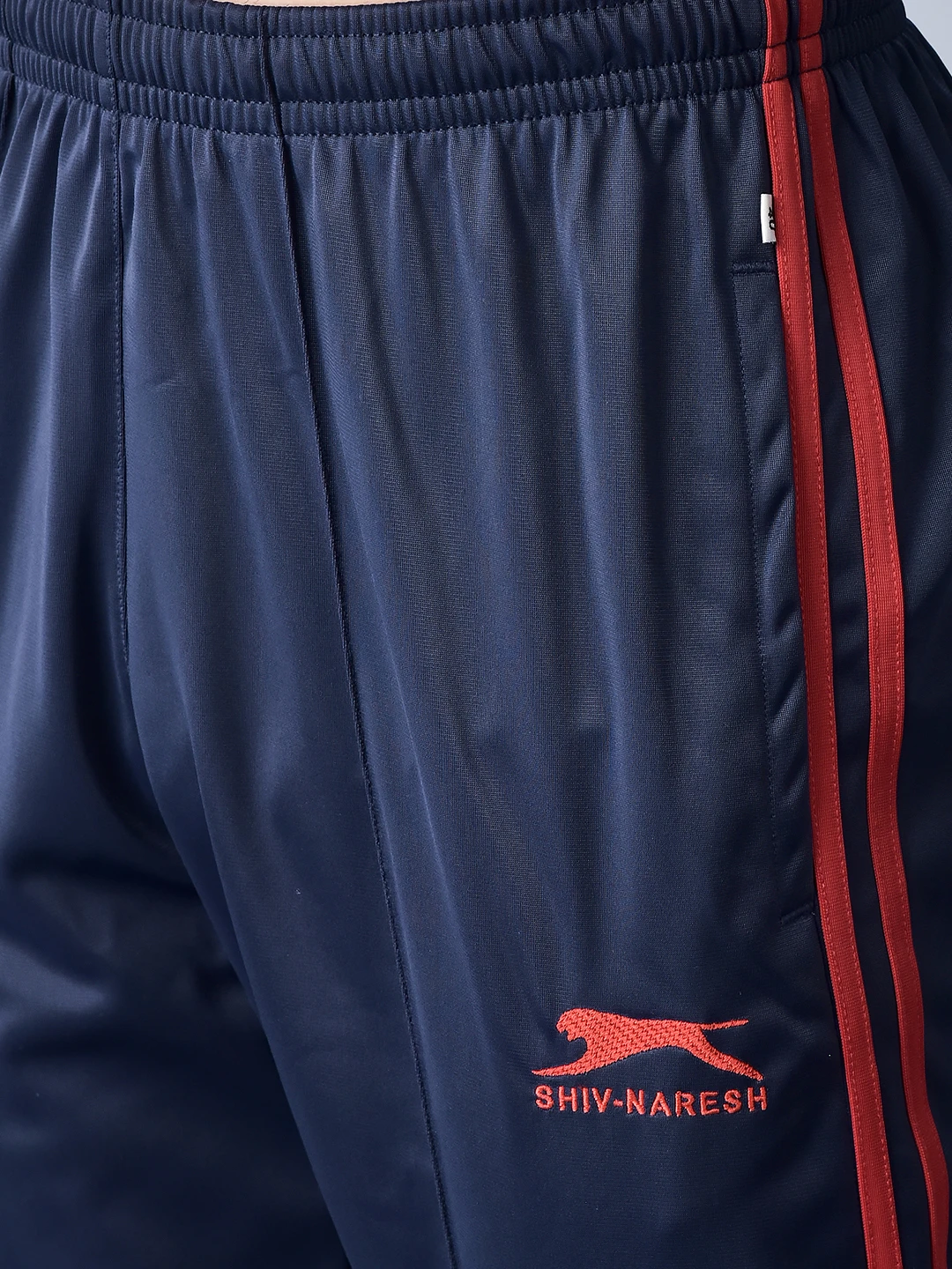 Essential Training Navy Blue/Red Trackpants for Men - Shivnaresh