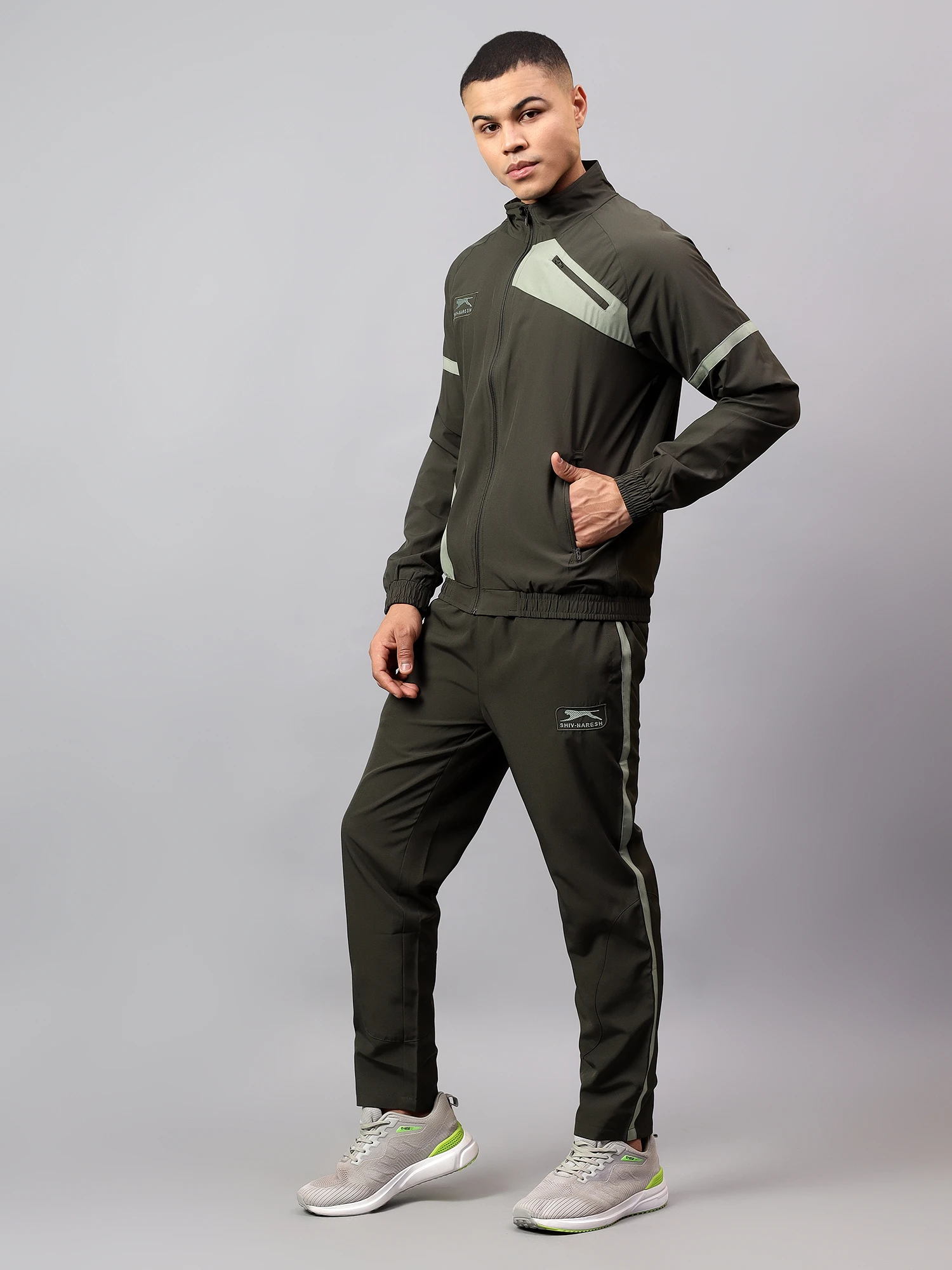 Black Olive Green & Pista Men's Tracksuit by Shiv Naresh