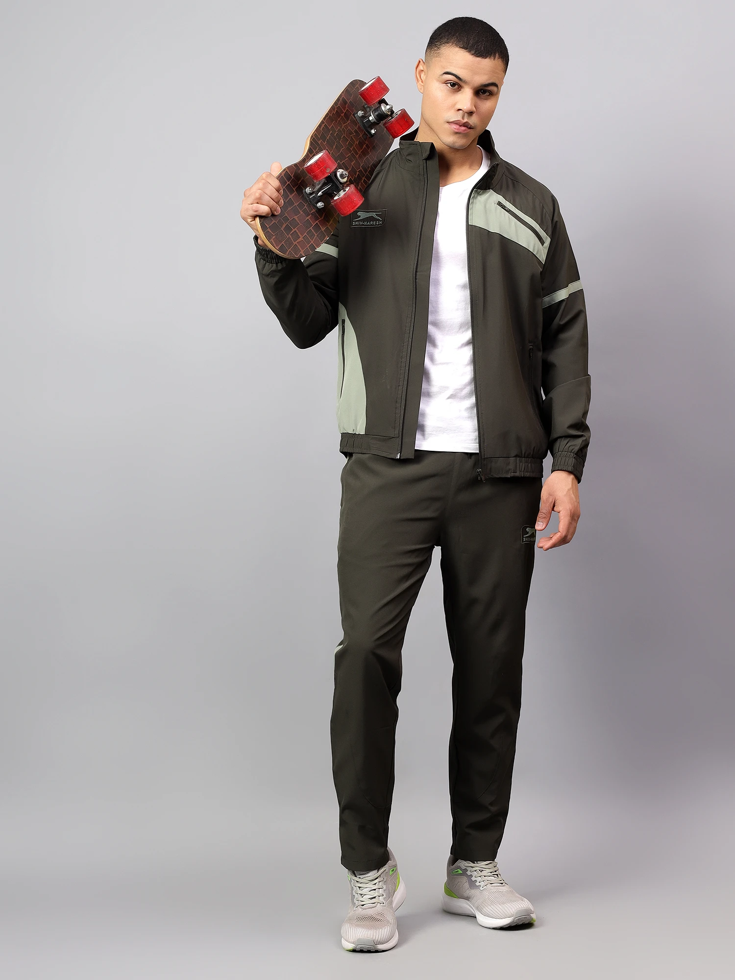 Black Olive Green & Pista Men's Tracksuit by Shiv Naresh