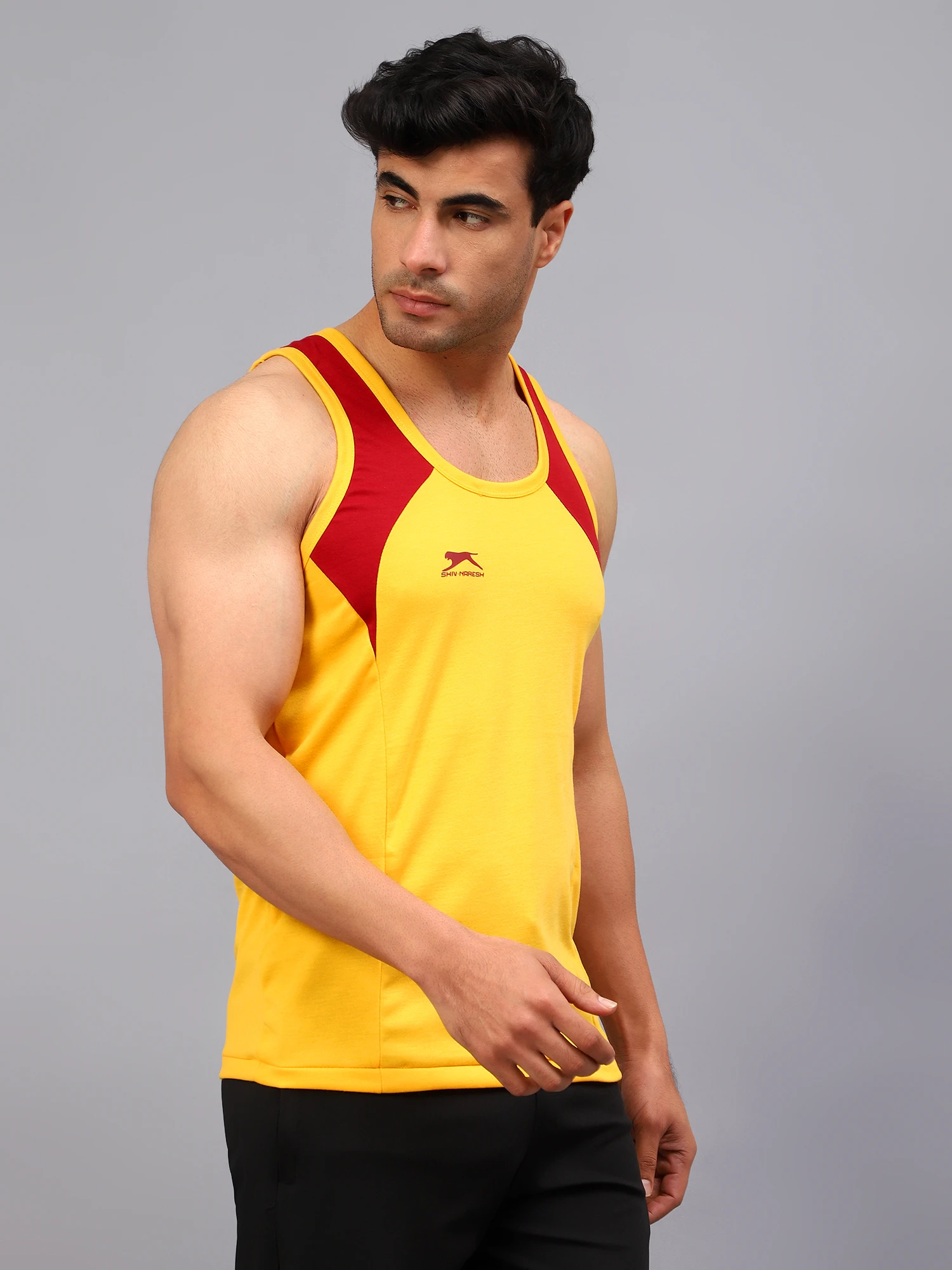 Yellow and maroon colored gym vest for men