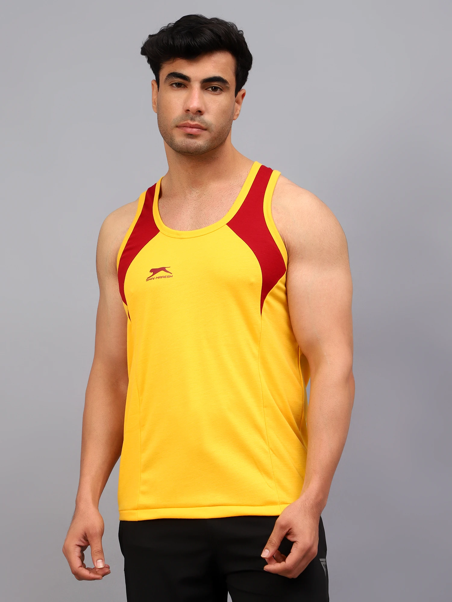 Yellow and maroon colored gym vest for men
