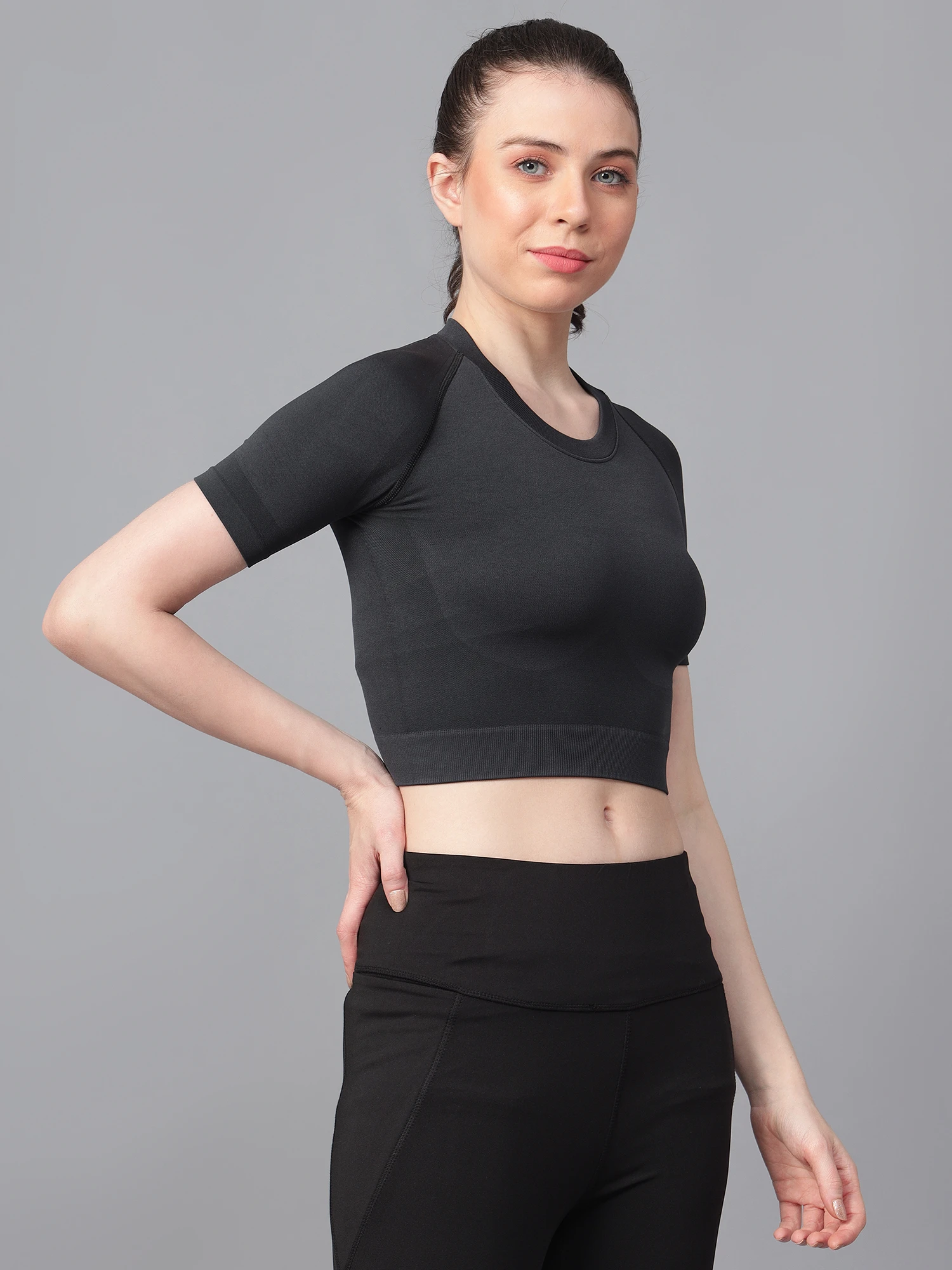Black seamless high impact gym crop top for women