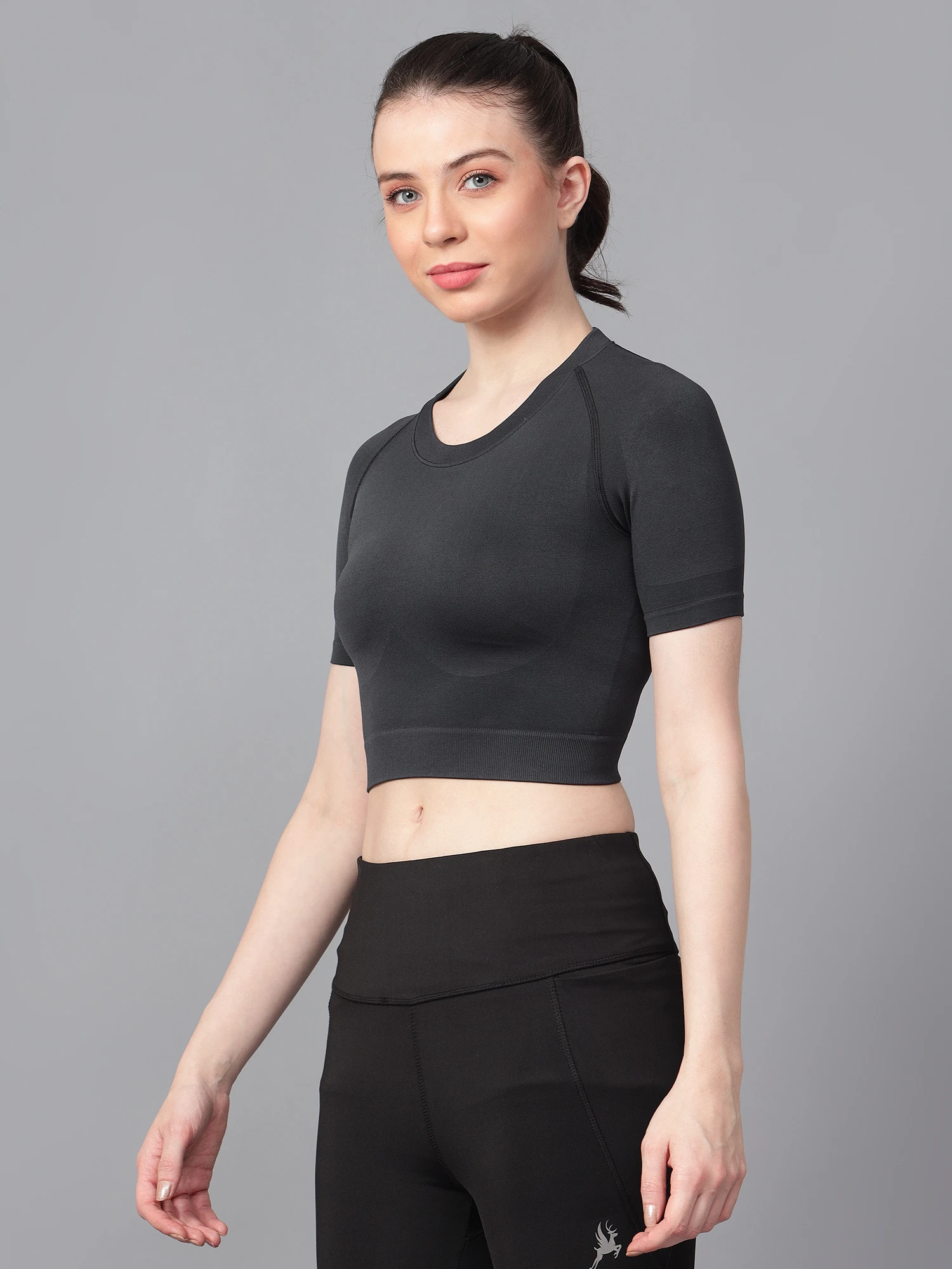 Black seamless high impact gym crop top for women