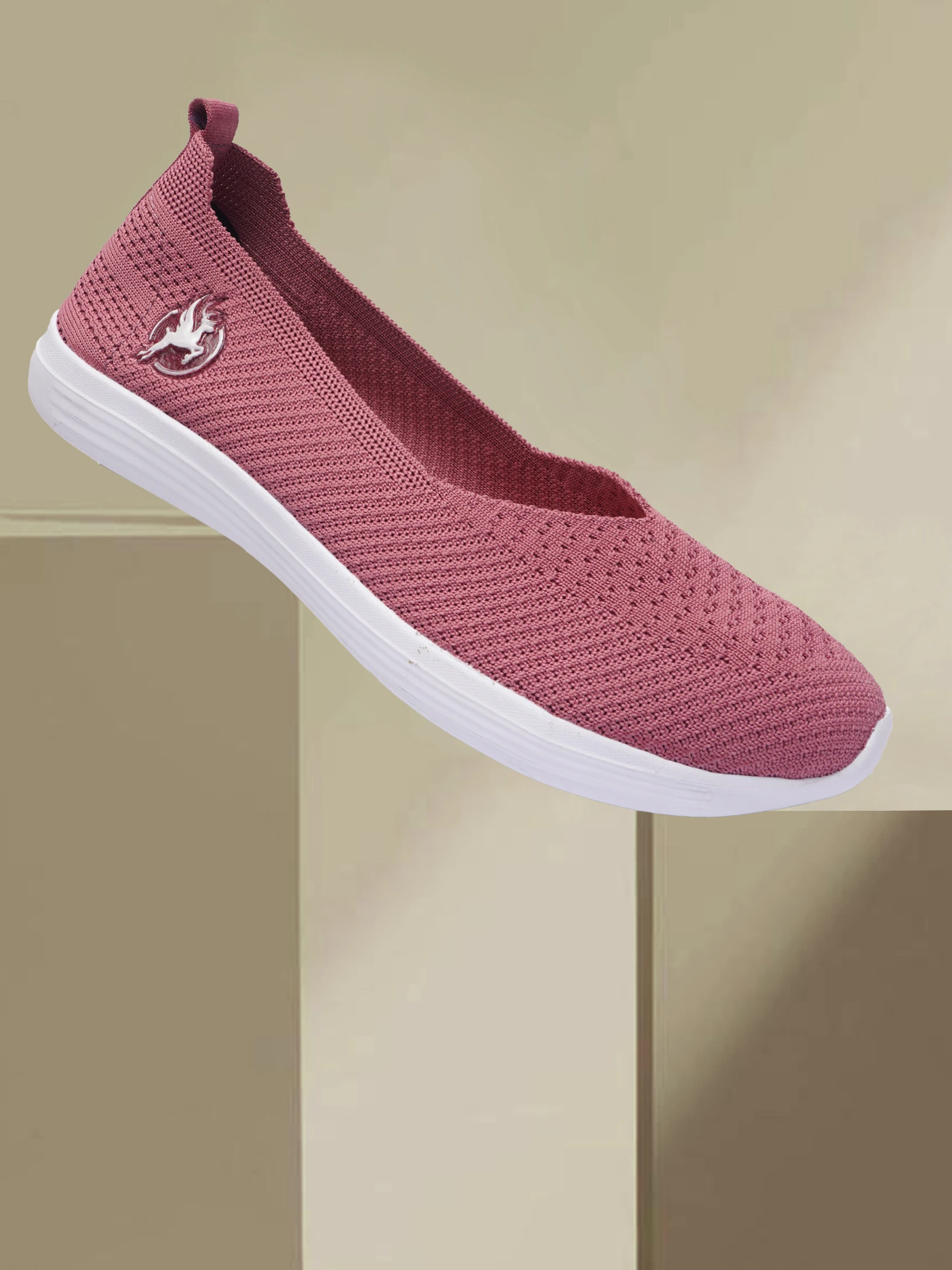 Peach slip-on shoes for women by Shivnaresh