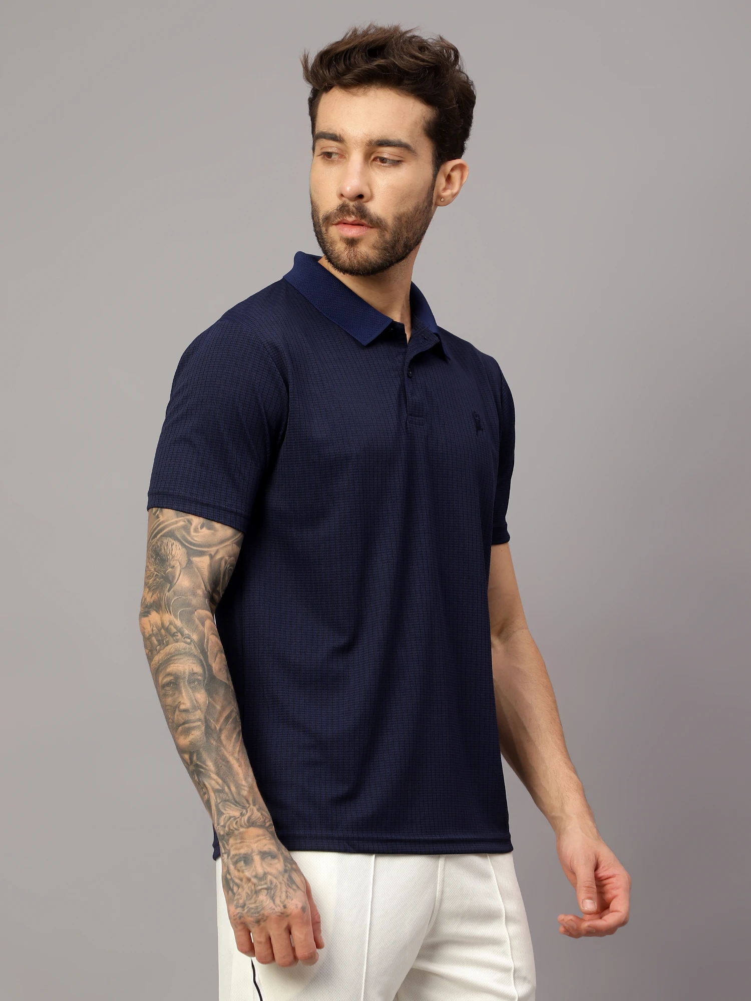 Textured Navy blue polo t shirt by Shiv Naresh