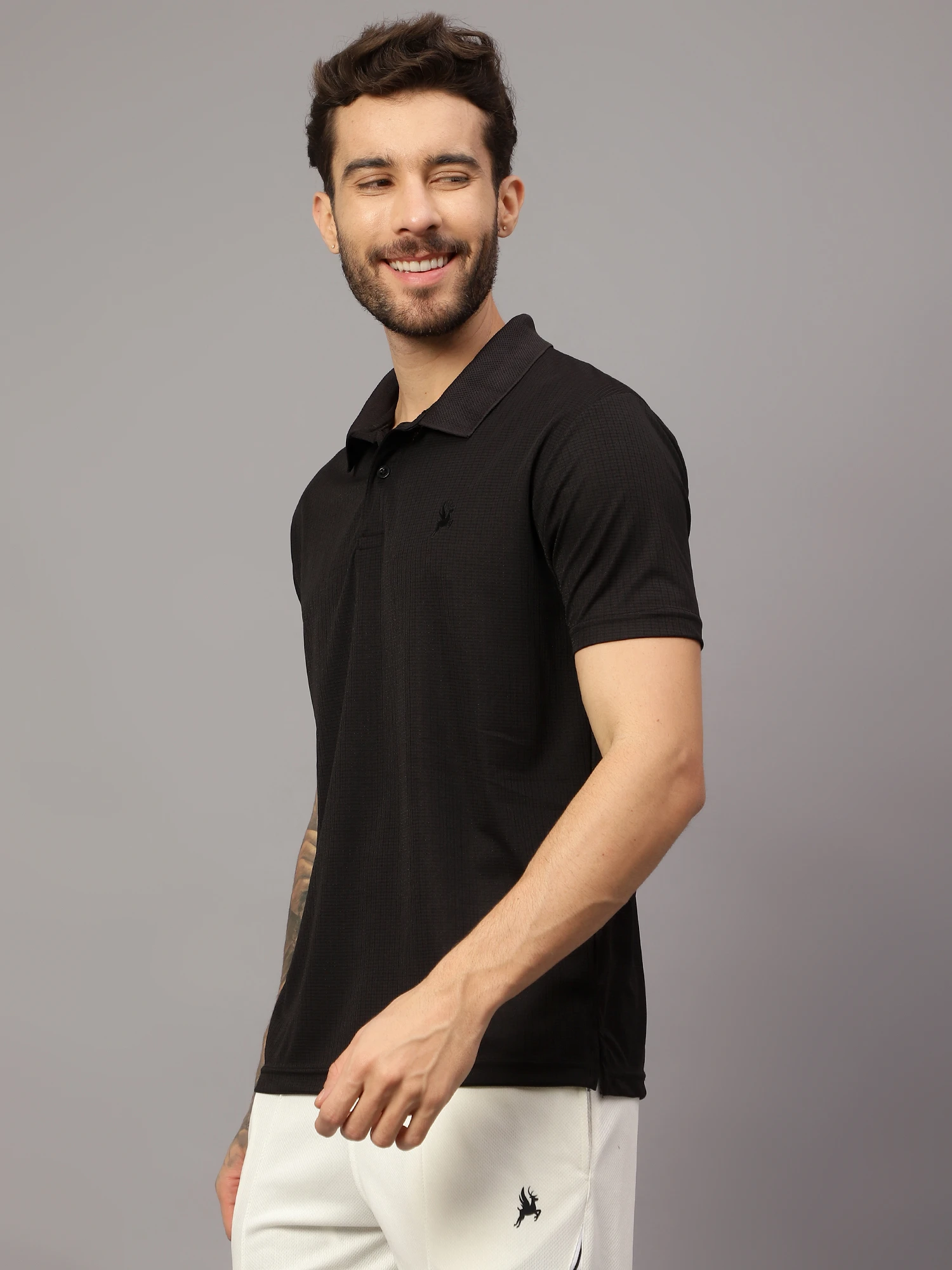 textured Black polo t shirt by Shiv Naresh
