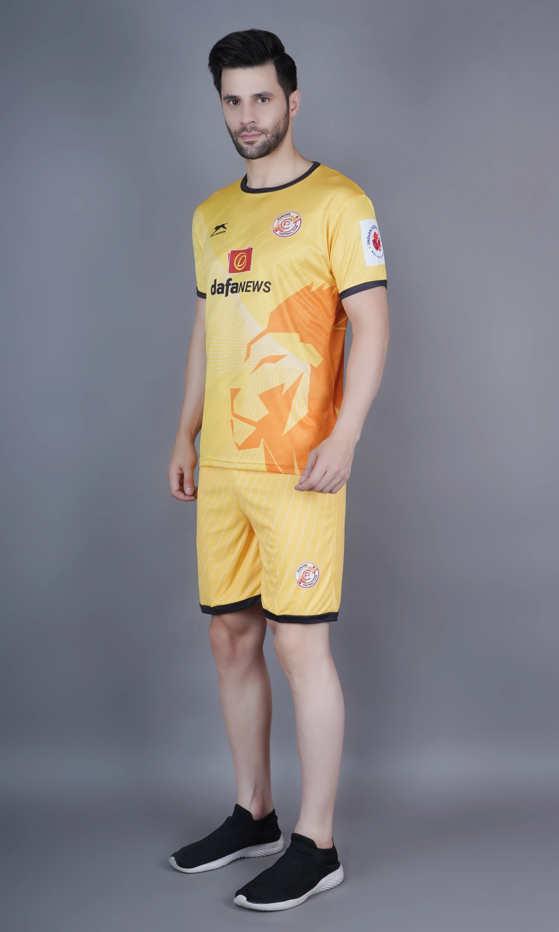 Shiv Naresh Punjab Football Club kit in yellow
