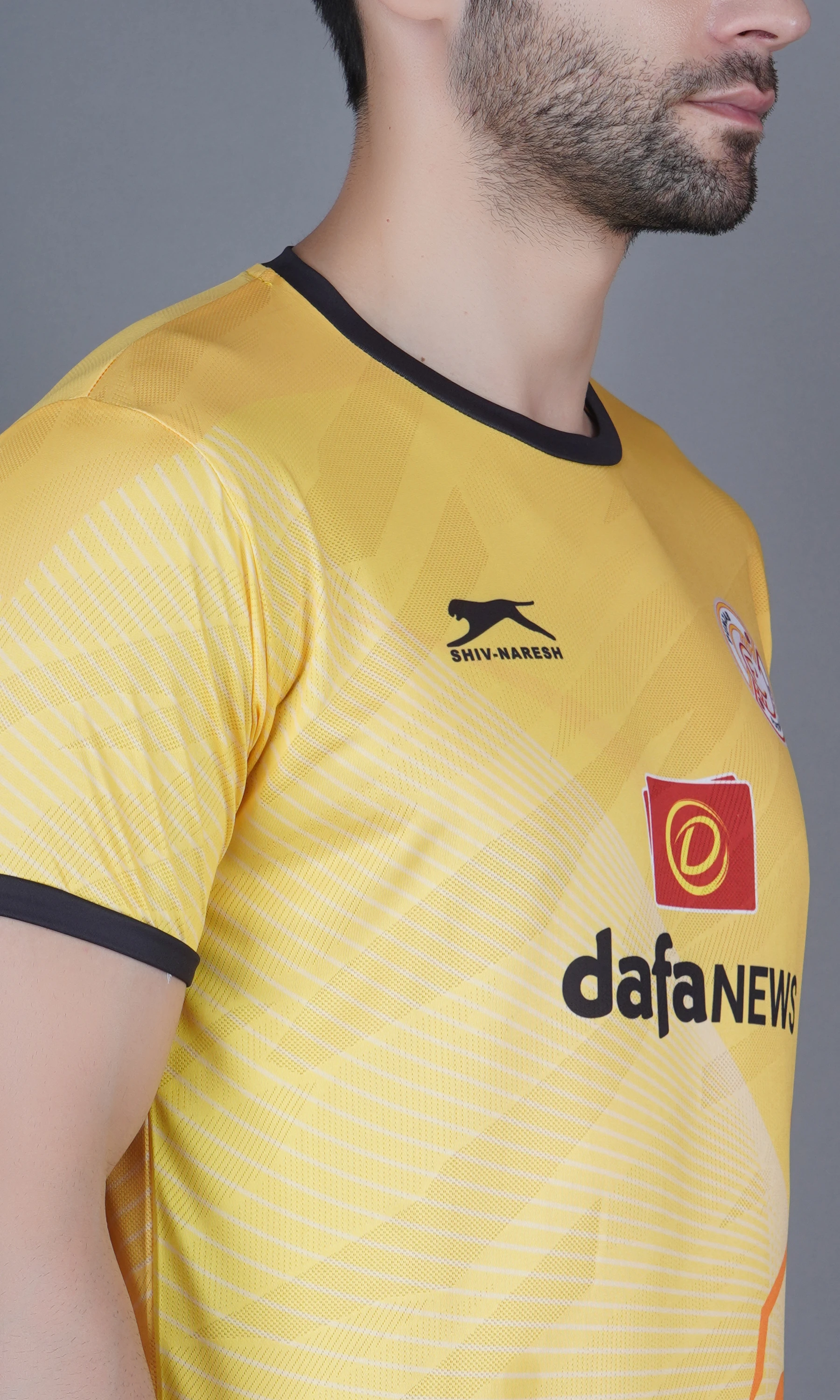 Shiv Naresh Punjab Football Club kit in yellow