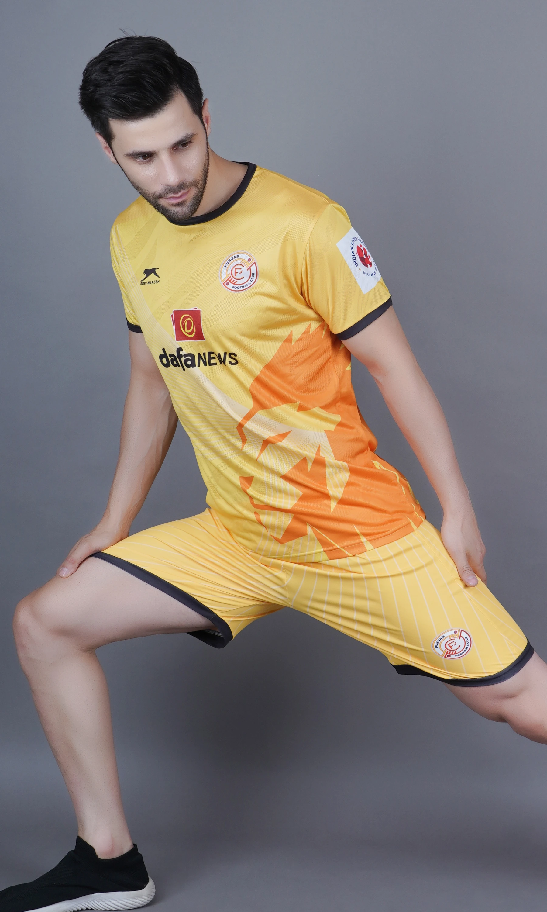 Shiv Naresh Punjab Football Club kit in yellow