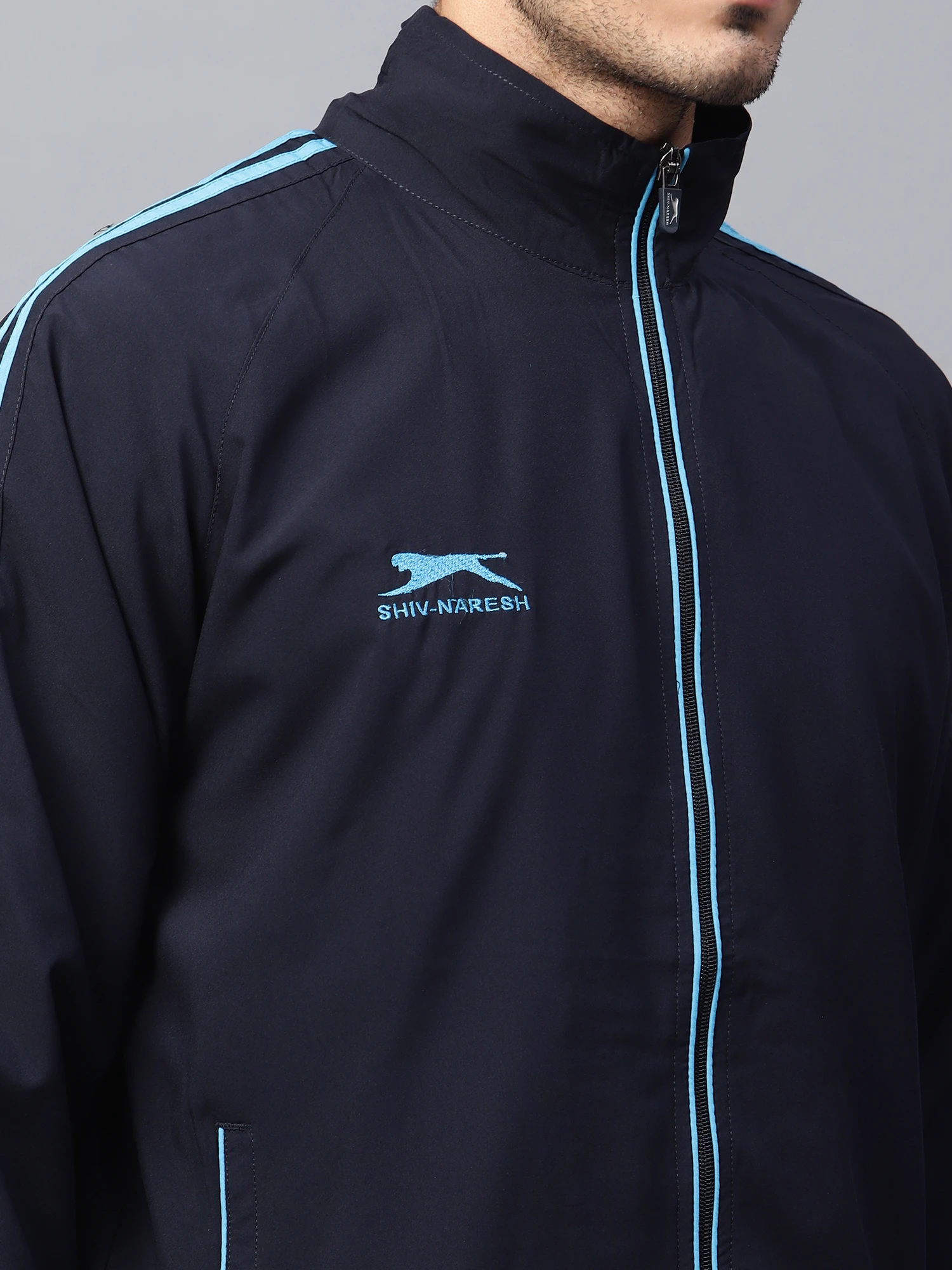 Men's active navy and cyan blue track suit