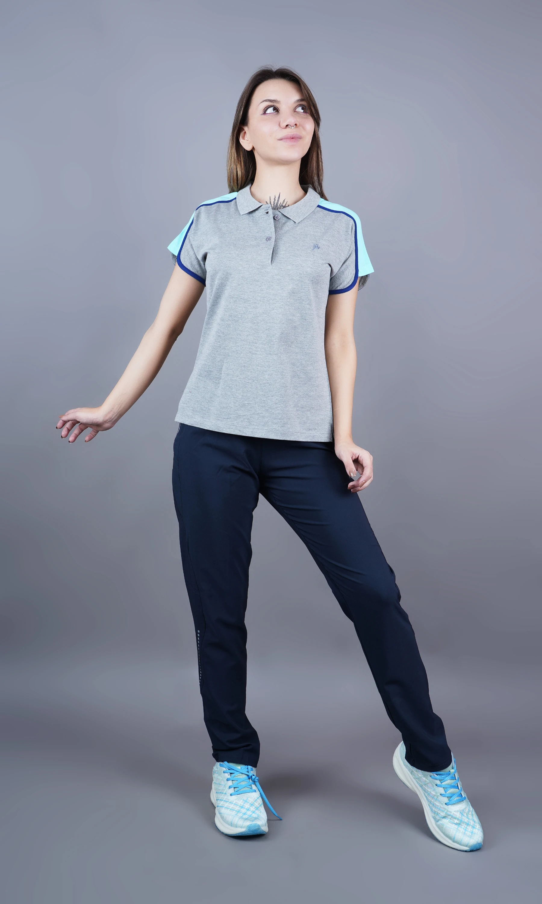 Grey solid polo t-shirt for women by Shiv Naresh