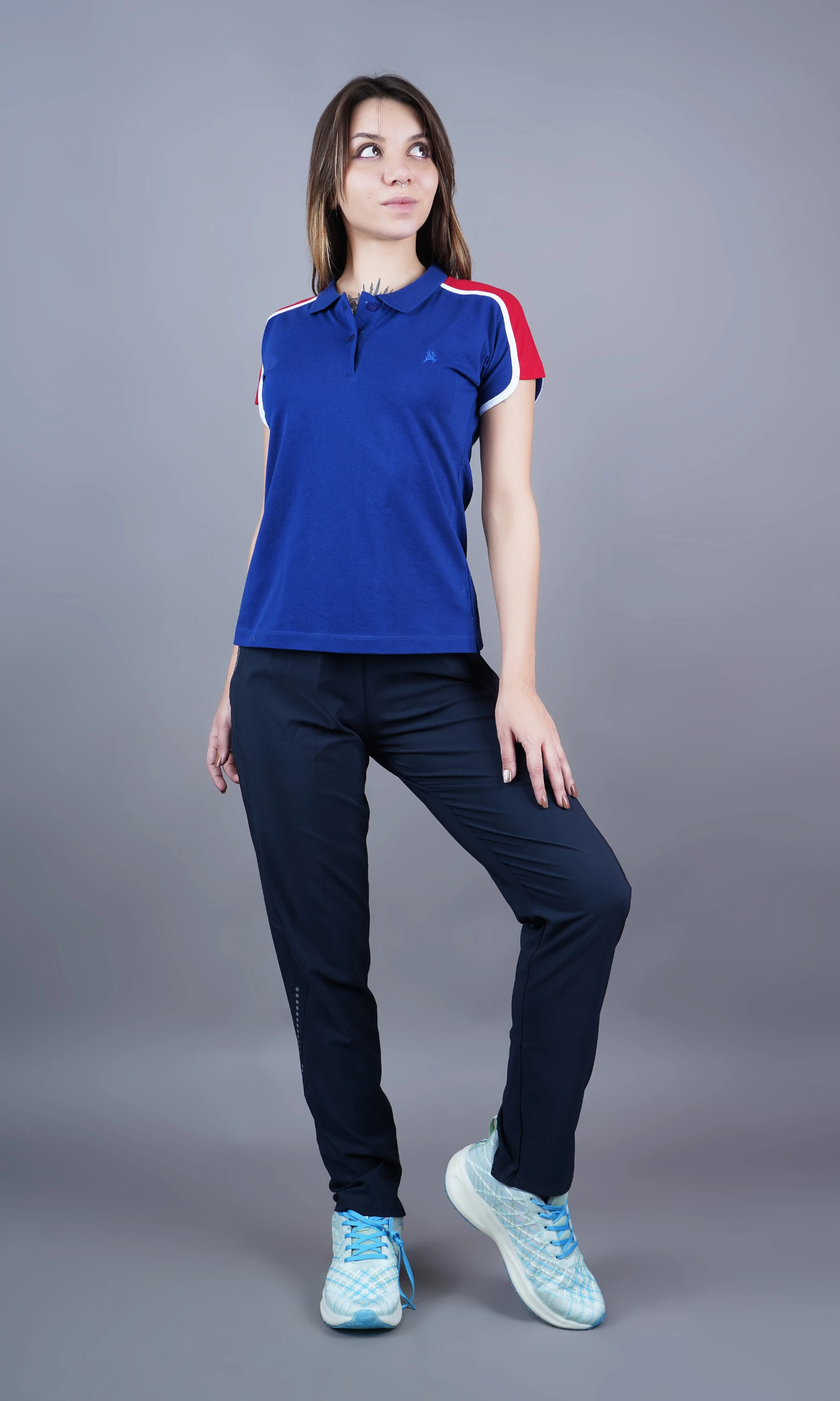 Blue solid polo t-shirt for women by Shiv Naresh