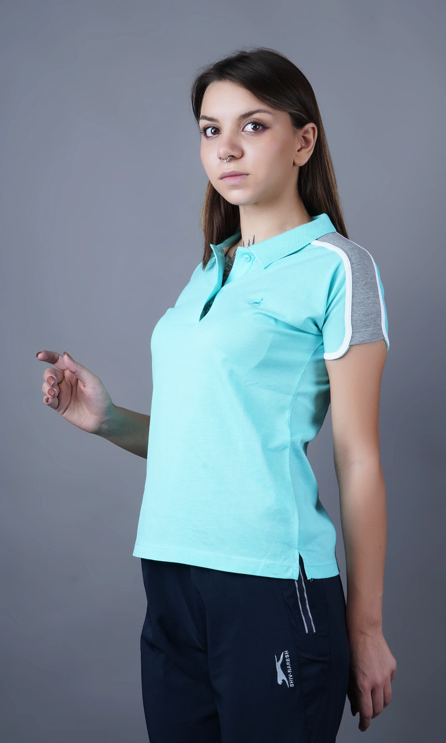Mint solid polo t-shirt for women by Shiv Naresh