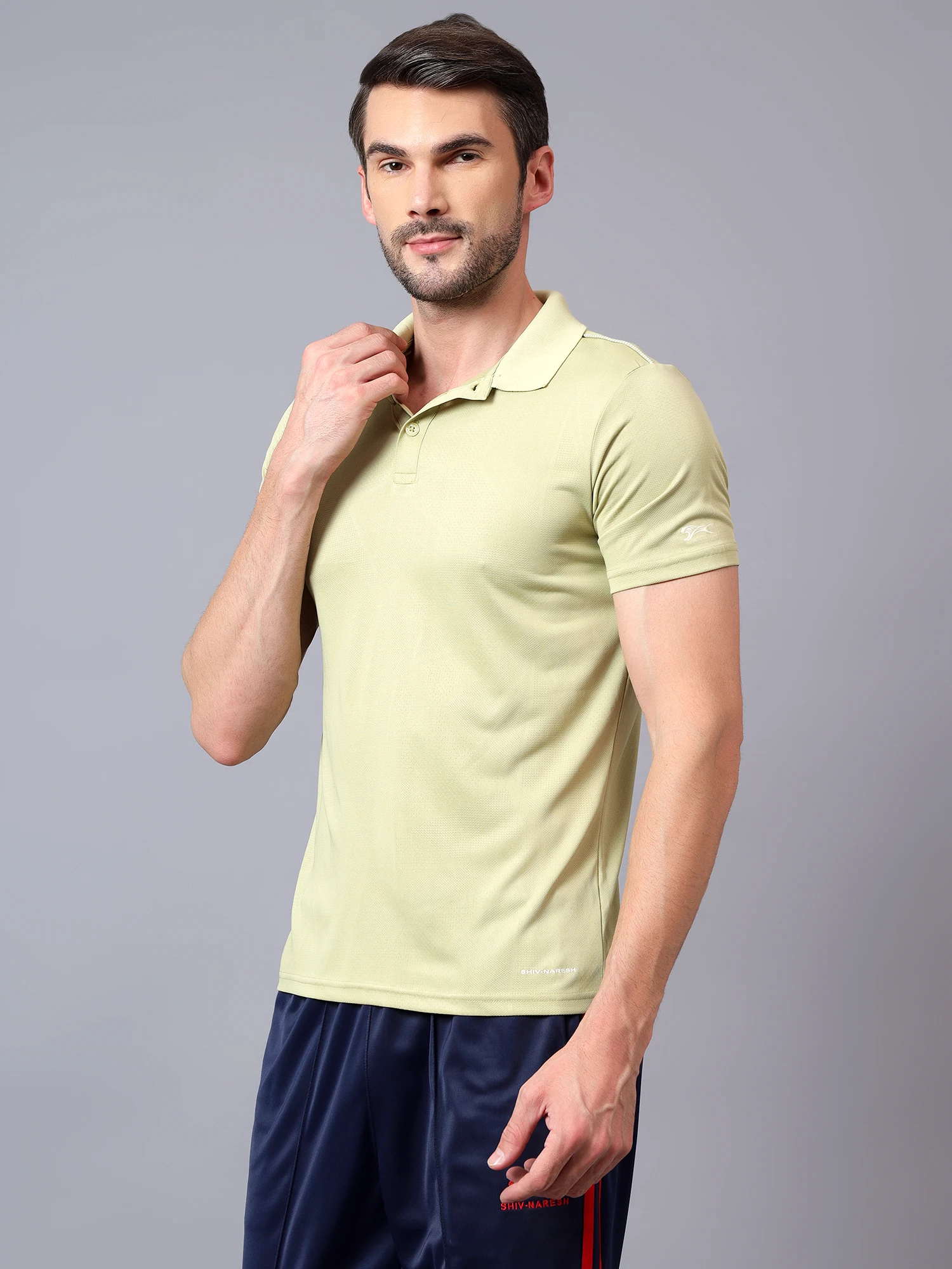performance polo tee green